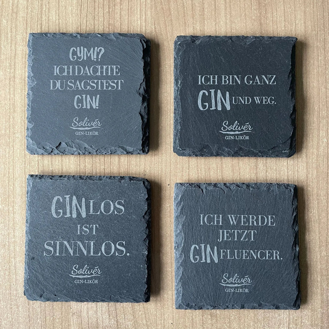 Quadratische Schiefer-Untersetzer mit Gin-Sprüchen. verschiedene Motive - im 4er Set